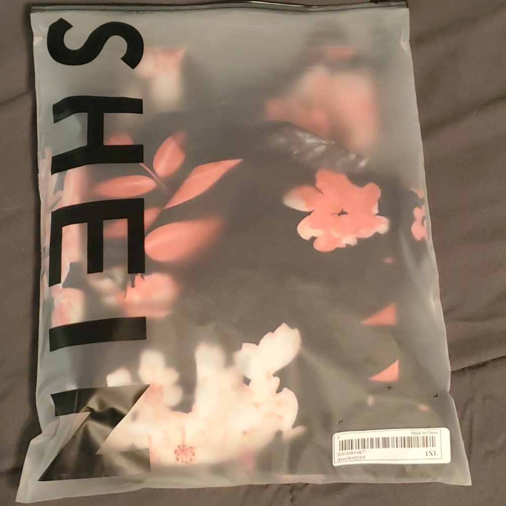 NIB. Never worn Shein black floral midi dress.